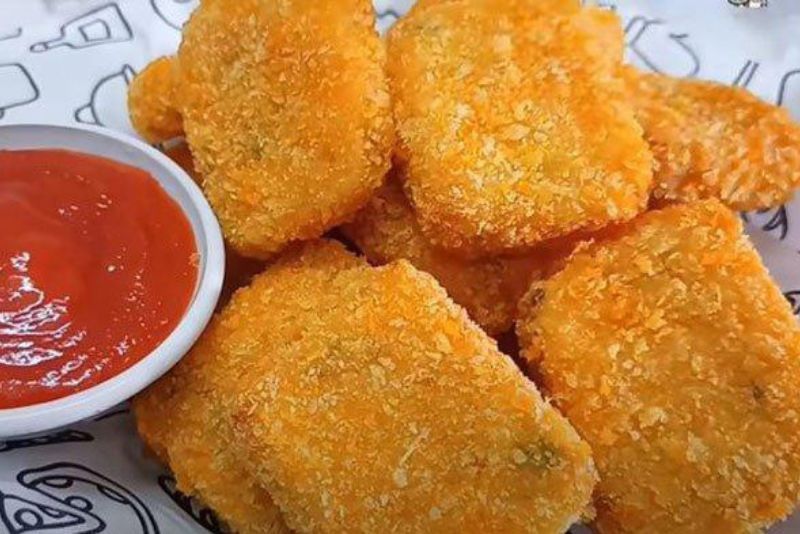 Ilustrasi nugget ayam lezat.