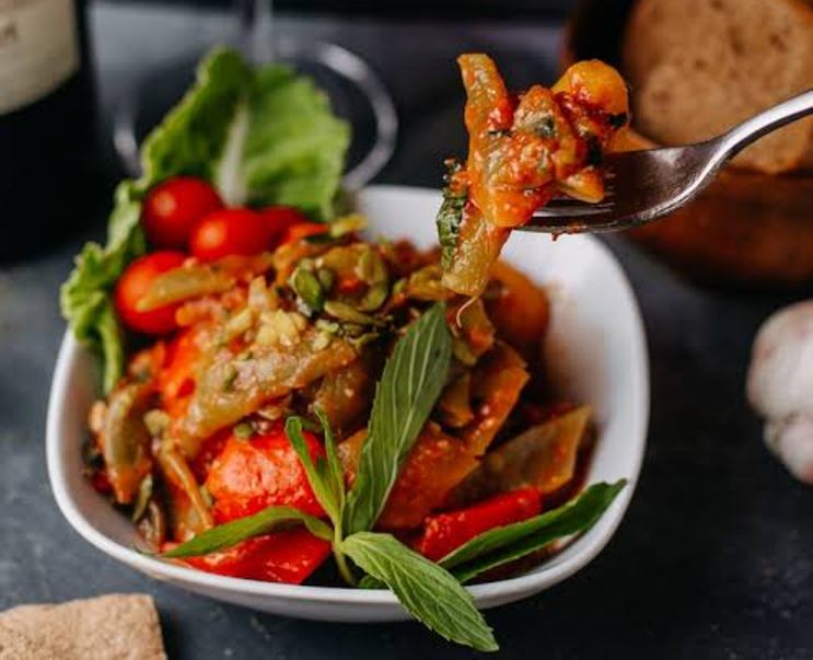 Ilustrasi resep rica-rica menthok khas Manado.