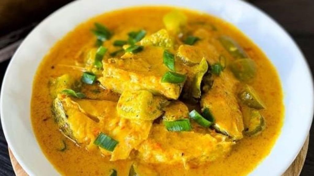 Ilustrasi ikan patin bumbu kuning.