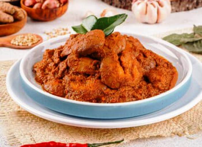 Ilustrasi rendang jengkol yang aroma menyengatnya tersamarkan.