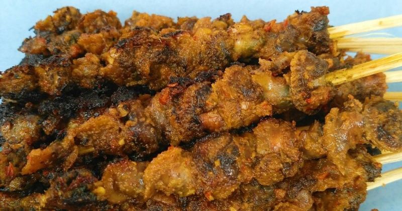 Ilustrasi sate kerang santan pedas.
