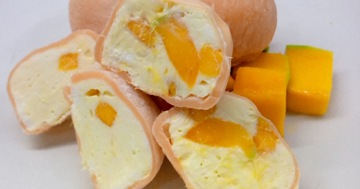 Ilustrasi mochi isi mangga yang creamy.