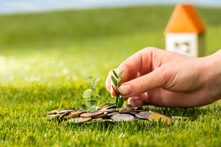 Ilustrasi investasi properti rumah atau tanah.
