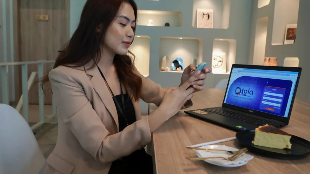 Ilustrasi layanan digital Qlola by BRI yang mendukung transaksi dan pengelolaan keuangan korporasi.