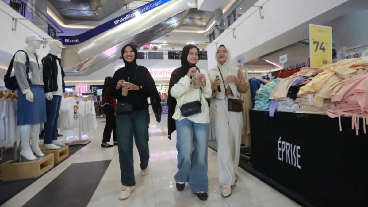Aktivitas masyarakat di Kota Madiun. BPS mencatat tingkat kesetaraan gender di Kota Pendekar terus membaik pada 2025. BAGAS BIMANTARA/JAWA POS RADAR MADIUN