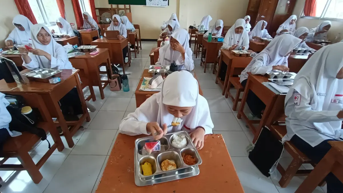 TERHENTI SEMENTARA: Program Makan Bergizi Gratis (MBG) di Pacitan dihentikan selama masa libur sekolah sesuai ketentuan Badan Gizi Nasional dan akan kembali berjalan setelah kegiatan belajar mengajar dimulai kembali. DOK RADAR PACITAN
