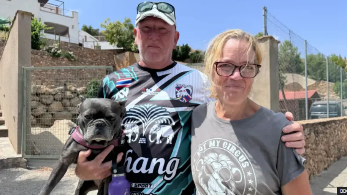 Emma and Simon Michell were relieved to find their home had not been damaged by the fire (BBC)