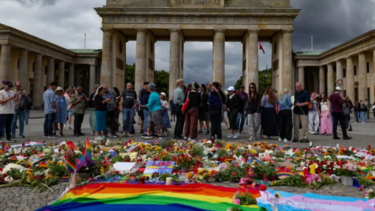 Tributes were laid at the Brandenburg Gate in central Berlin after Saturday’s attack on one of Europe’s biggest Pride parades. (The Guardian)