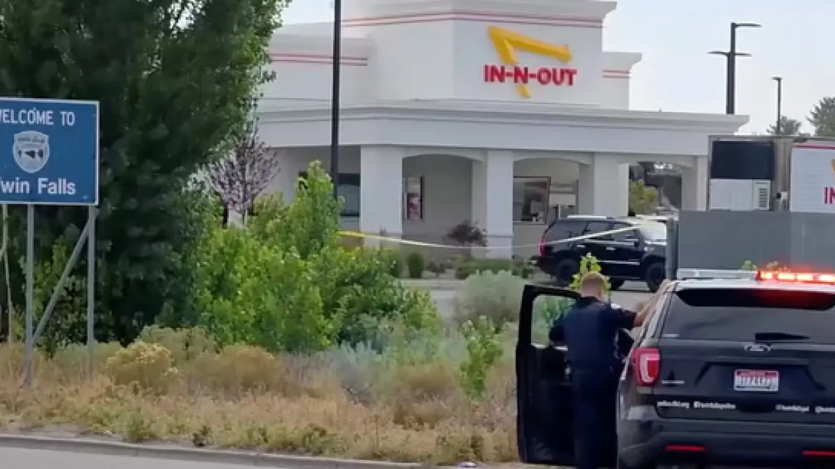 Police and emergency crews at the site of the fatal shooting in Twin Falls. (The Guardian)