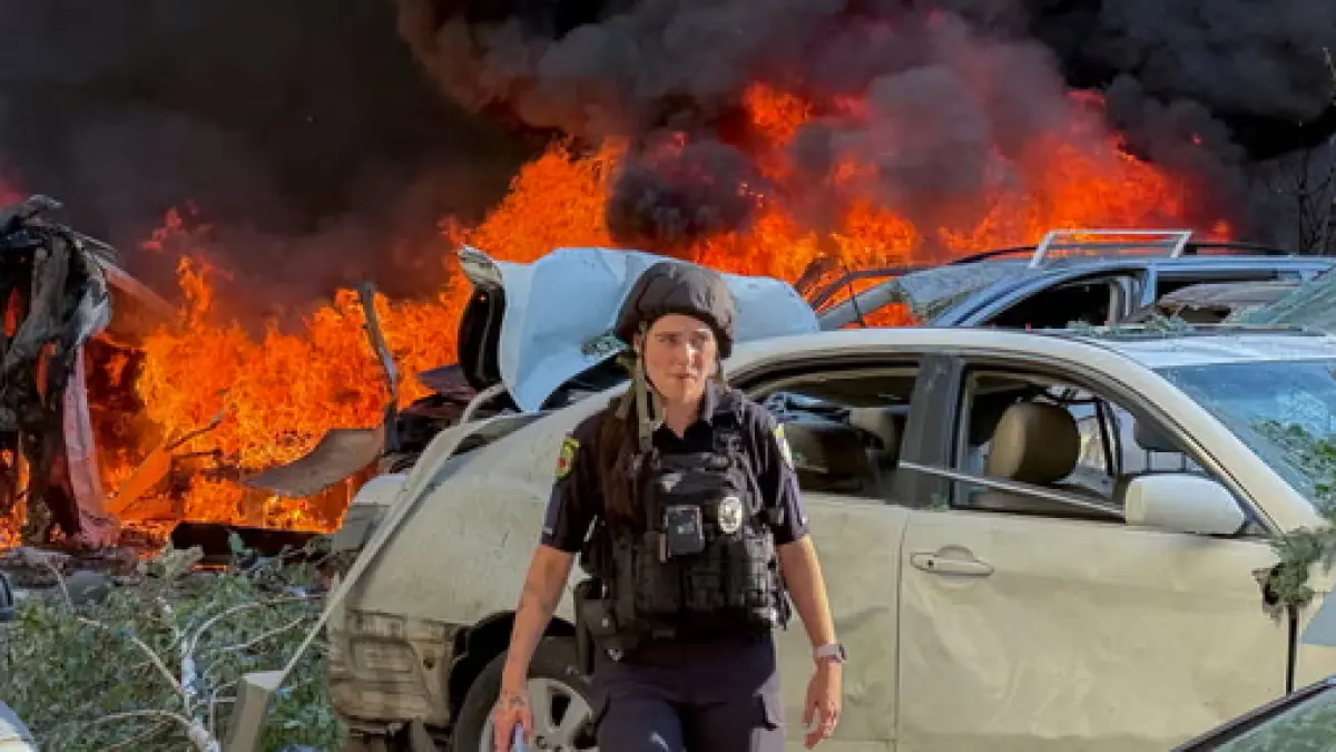 A police officer at the site of the Russian guided bomb attack on a residential area in Zaporizhzhia, Ukraine. (The Guardian)