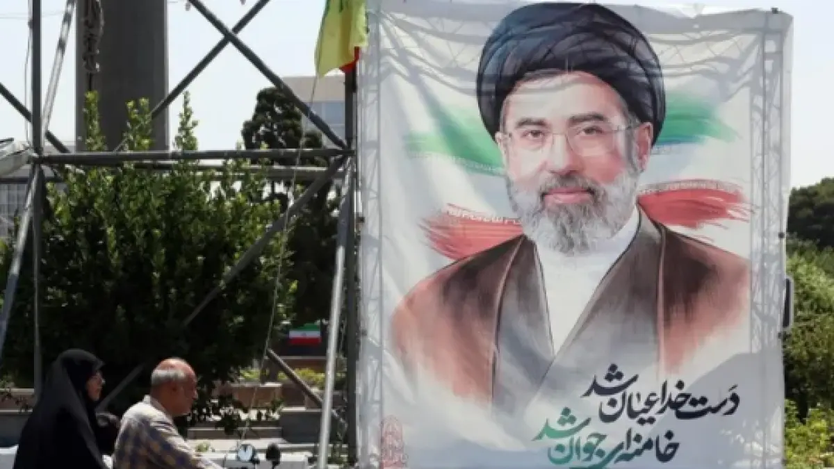 Iranian supreme leader Ayatollah Mojtaba Khamenei, depicted in a billboard, has not appeared in public since the strike that killed his father (BBC)