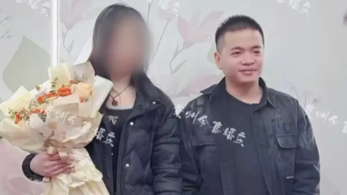 Wang with his ex-wife in a photo taken soon after their wedding (BBC)