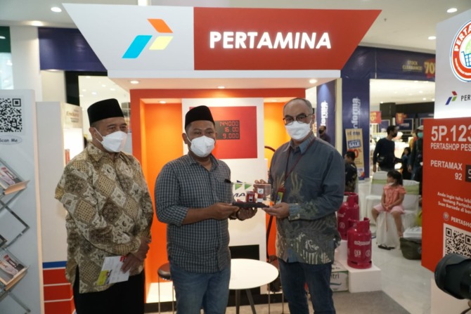 KOLABORASI: Pertamina dengan Pemprov Jatim sepakat saling mendukung pengembangan Pertashop pada program OPOP. (PERTAMINA FOR RADAR MADIUN)