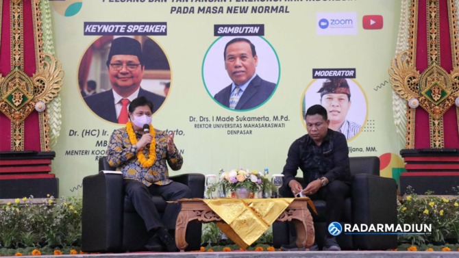 Menko Perekonomian Airlangga Hartarto pada seminar nasional di Bali.