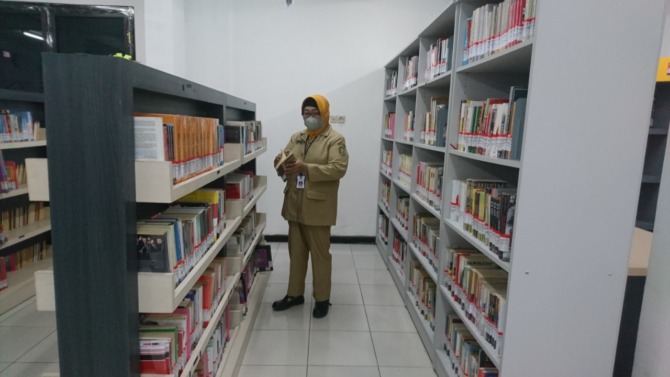 Ilustrasi Foto : Tahun ini Dinas Perpustakaan dan Kearsipan Kota Madiun menarget empat naskah kuno telah terdigitalisasi. (Dokumen/Jawa Pos Radar Madiun)