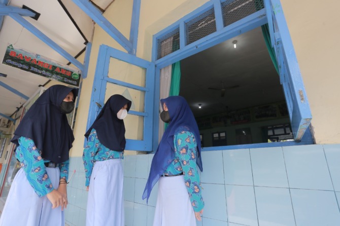 AYO SEKOLAH: Pelaksanaan PPDB SD-SMP untuk tahap pertama di Kota Madiun telah rampung. Puluhan sekolah belum mendapatkan siswa baru pada tahap ini. (BAGAS BIMANTARA/JAWA POS RADAR MADIUN)
