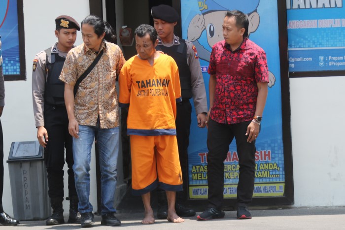 Tersangka Samidi resmi ditahan di Polres Malang.