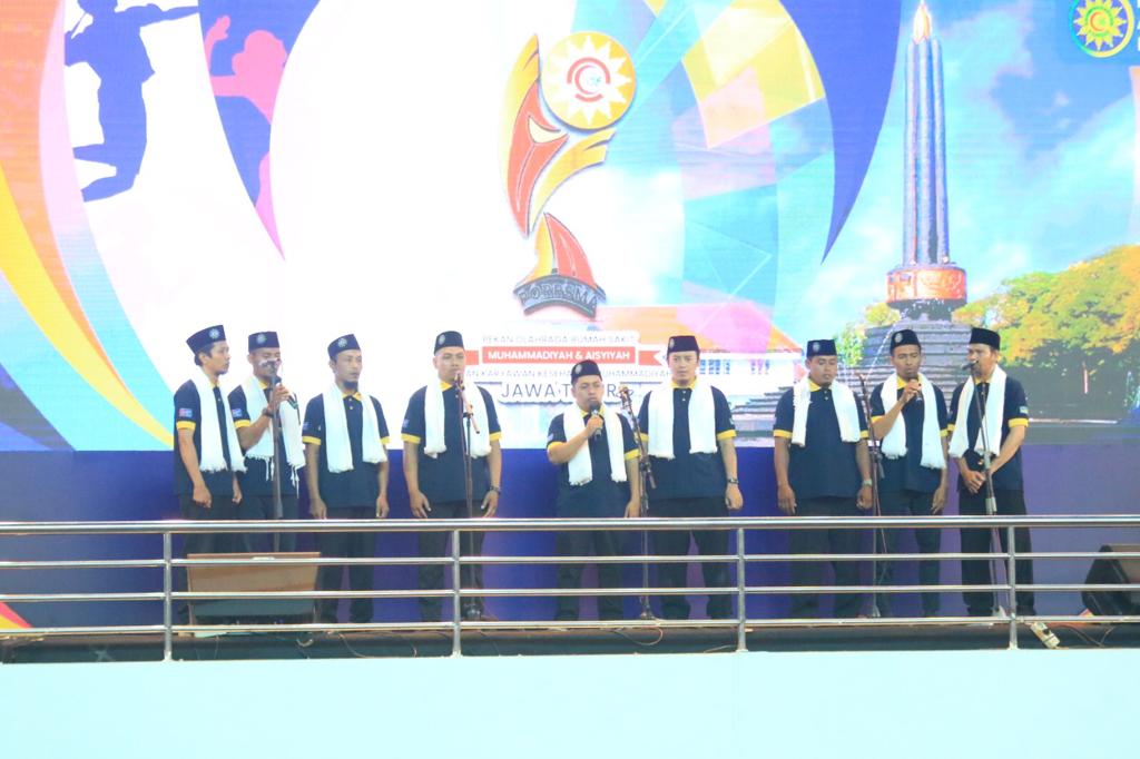 PEMBACAAN: Pembacaan ayat suci Alquran dalam pembukaan PORRSMA X 2023 oleh panitia kegiatan di panggung utama GOR Ken Arok, Kota Malang.