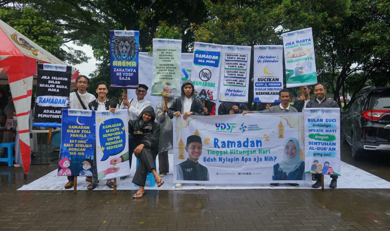 PIONER : Keceriaan Tahrib Ramadan 1445 H YDSF Malang ditengah guyuran hujan Minggu (10/3) pagi.