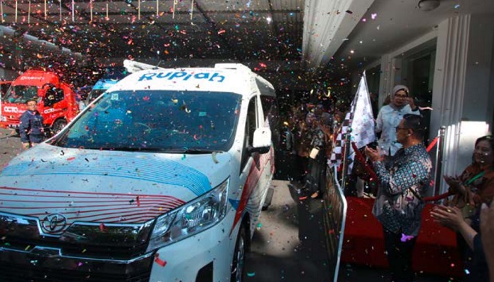 MENINGKAT: Kantor Perwakilan (KPw) Bank Indonesia (BI) Malang me-launching program layanan kas keliling kemarin. Layanan itu bisa diakses lewat aplikasi PINTAR.