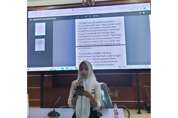 FOKUS : Gizka Oriza Rahma Arifin dari X AKL 2 membacakan hasil karya tulisnya saat JGTS berlangsung.