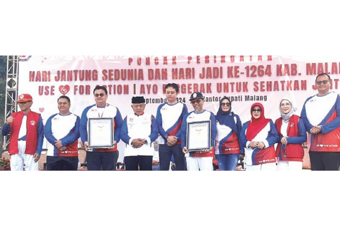 LUAR BIASA: Perki Cabang Malang memecahkan rekor Muri penggunaan aplikasi Detak C Minggu pagi (15/9).