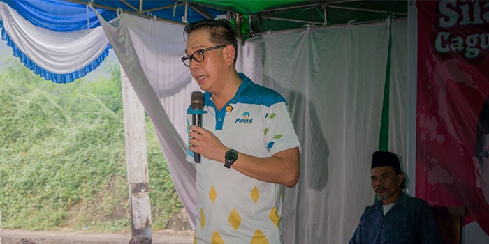 Potret Benny Laos