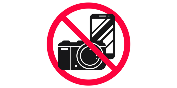 Grafis dilarang memfoto. (Freepik)