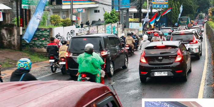 MULAI NAIK: Volume kendaraan di Jalan Ahmad Yani, Blimbing menuju arah utara juga cukup padat, kemarin. Mayoritas bergerak meninggalkan Kota Malang. Beberapa kendaraan ada yang menuju Kota Batu.