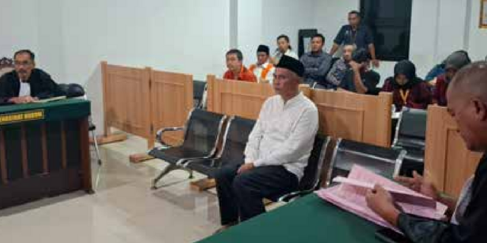 DUGAAN PENIPUAN: Eks Kades Pagak Mu&rsquo;asan menjalani sidang di Pengadilan Negeri (PN) Kepanjen.