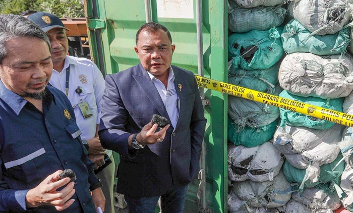 RUGIKAN NEGARA: Bareskrim Polri membongkar salah satu kontainer berisi batu bara ilegal yang dikirim dari IKN kemarin.