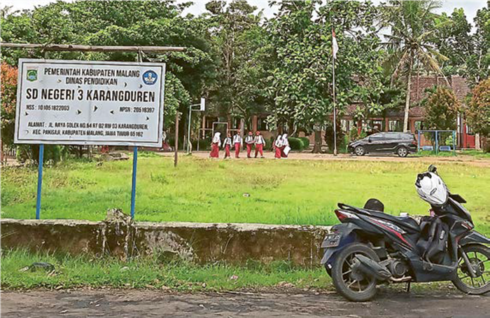BERTAMBAH: SDN 3 Karangduren di Kecamatan Pakisaji masuk dalam daftar merger tahun ini. Lokasinya yang bersebelahan dengan SDN 2 Karangduren jadi penyebabnya.