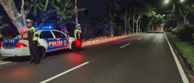 PATROLI: Anggota Satlantas Polres Malang siaga di Jalur Lingkar Barat (Jalibar) Kepanjen-Ngajum. Kawasan tersebut kerap jadi lokasi balap liar.