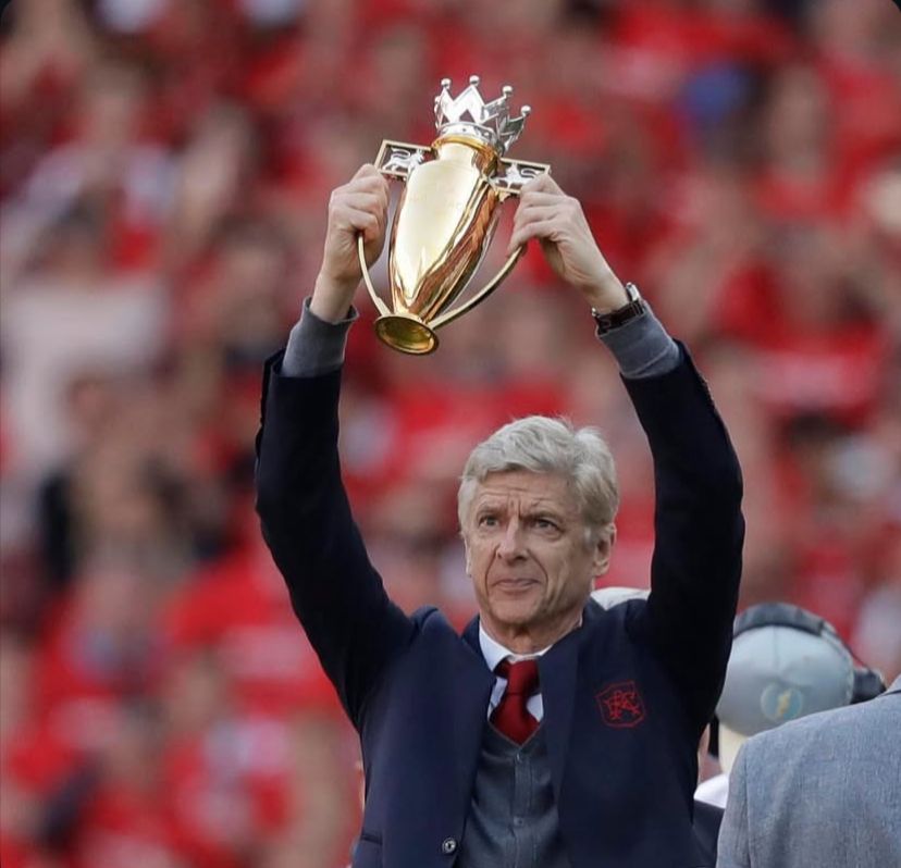 PIALA EMAS: Arsenal di bawah asuhan Arsene Wenger berhasil menaklukkan Liga Inggris pada musim 2003-04.