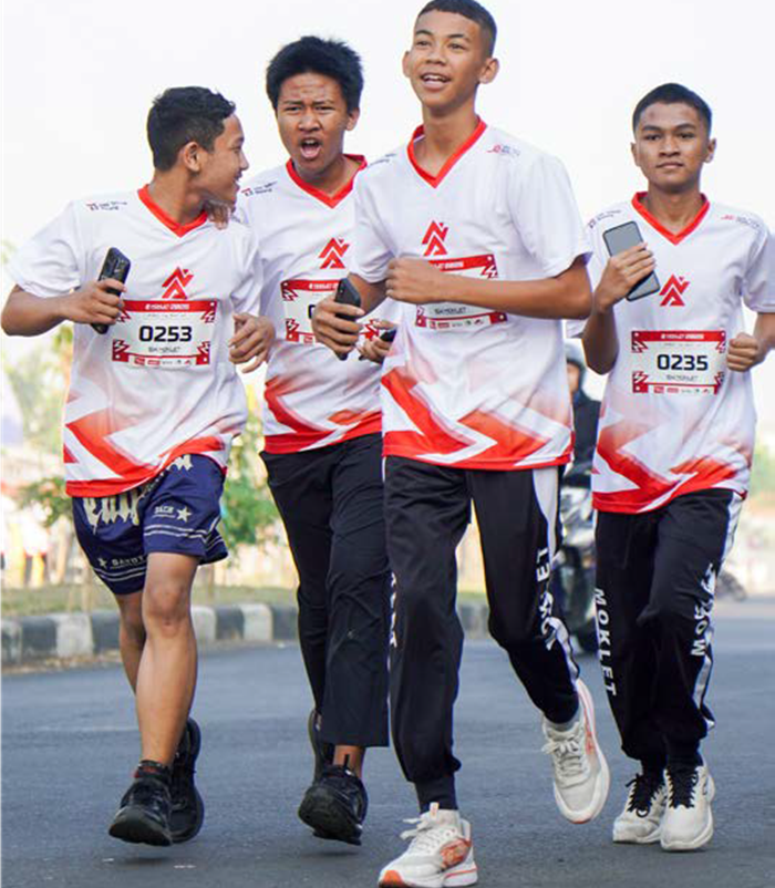 HAPPY ENDING: Dies Natalies ke-33 SMK Telkom Malang ditutup  dengan berolahraga bersama (Fun Runniversary) dan pembagian  doorprize, Minggu (28/9).