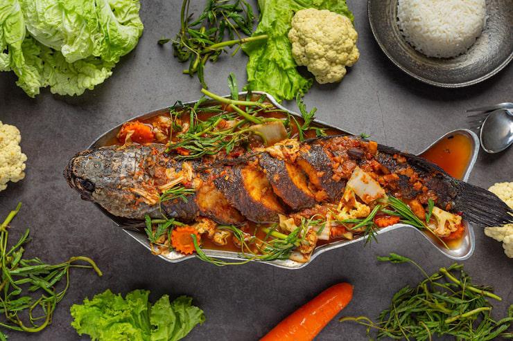MENGGUGAH SELERA: Ilustrasi ikan bakar dengan bumbu gurih dan lezat.
