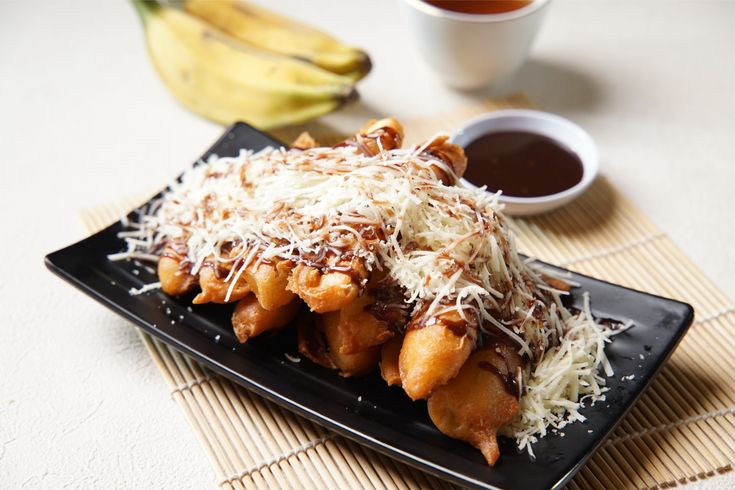 MANISNYA BIKIN BAHAGIA: Pisang keju hangat dengan lelehan keju tebal jadi teman sempurna buat sore santai di Pasuruan
