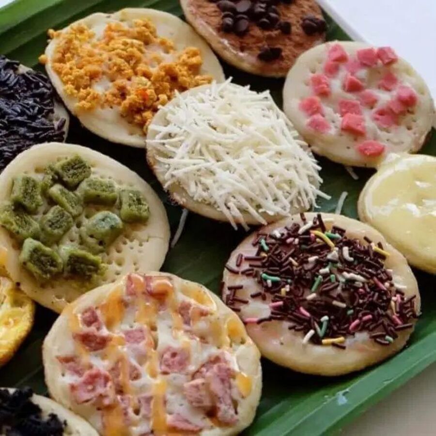 LEMBUT: Surabi khas Malang disajikan hangat dengan aroma santan yang wangi dan cita rasa otentik yang menggugah selera.