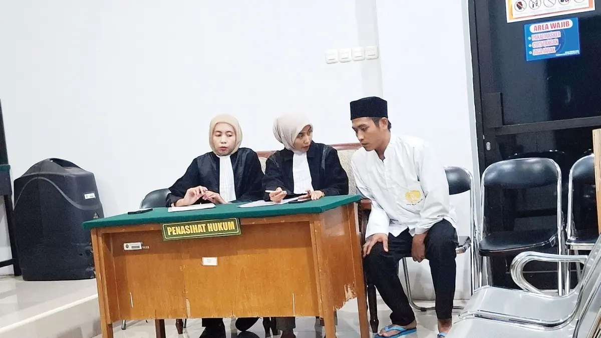 Nur Hude alias Huda, 28, menjalani sidang di Pengadilan Negeri (PN) Kepanjen