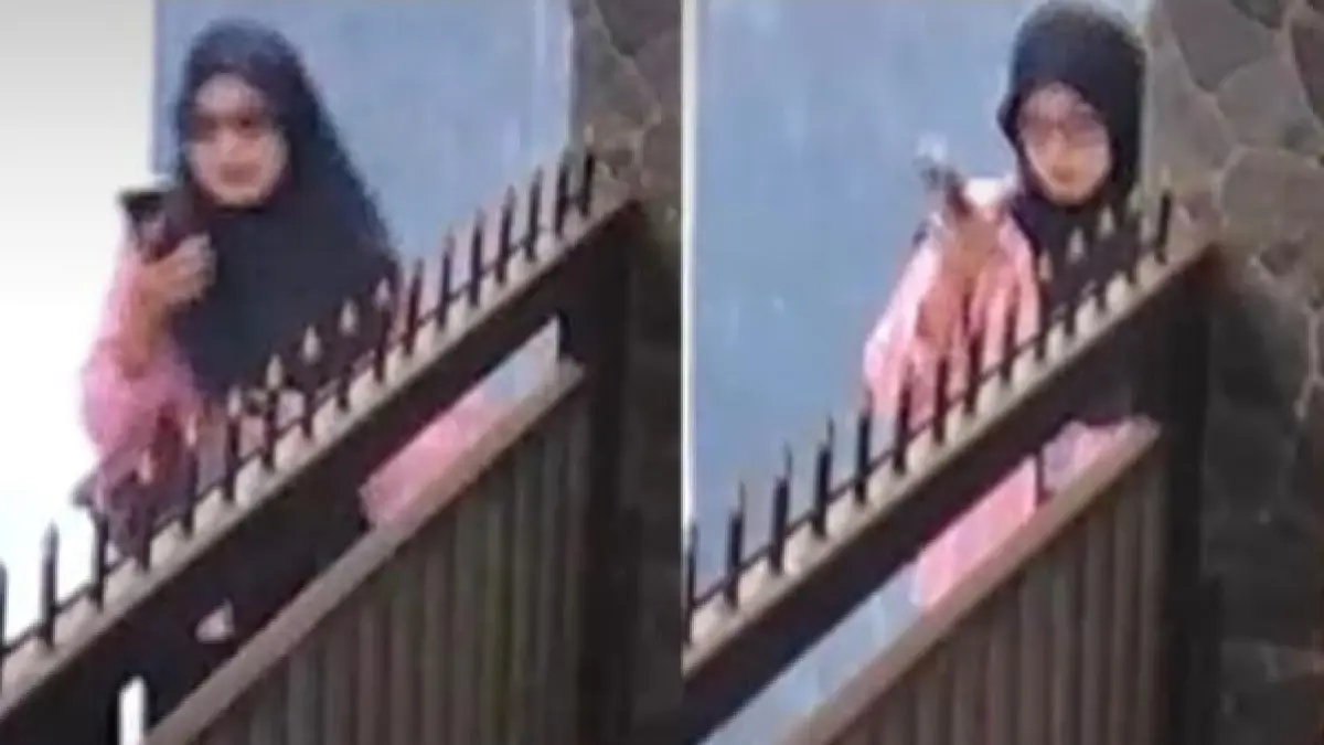 Perempuan berjilbab terekam CCTV diduga mencuri sepeda motor di kos Jalan Bandulan, Kota Malang. (Istimewa)