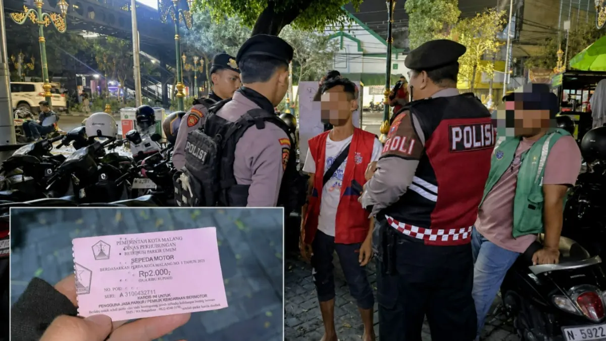 Polisi mengamankan seorang jukir nakal di Kajoetangan Heritage. (Humas Polresta Malang Kota)