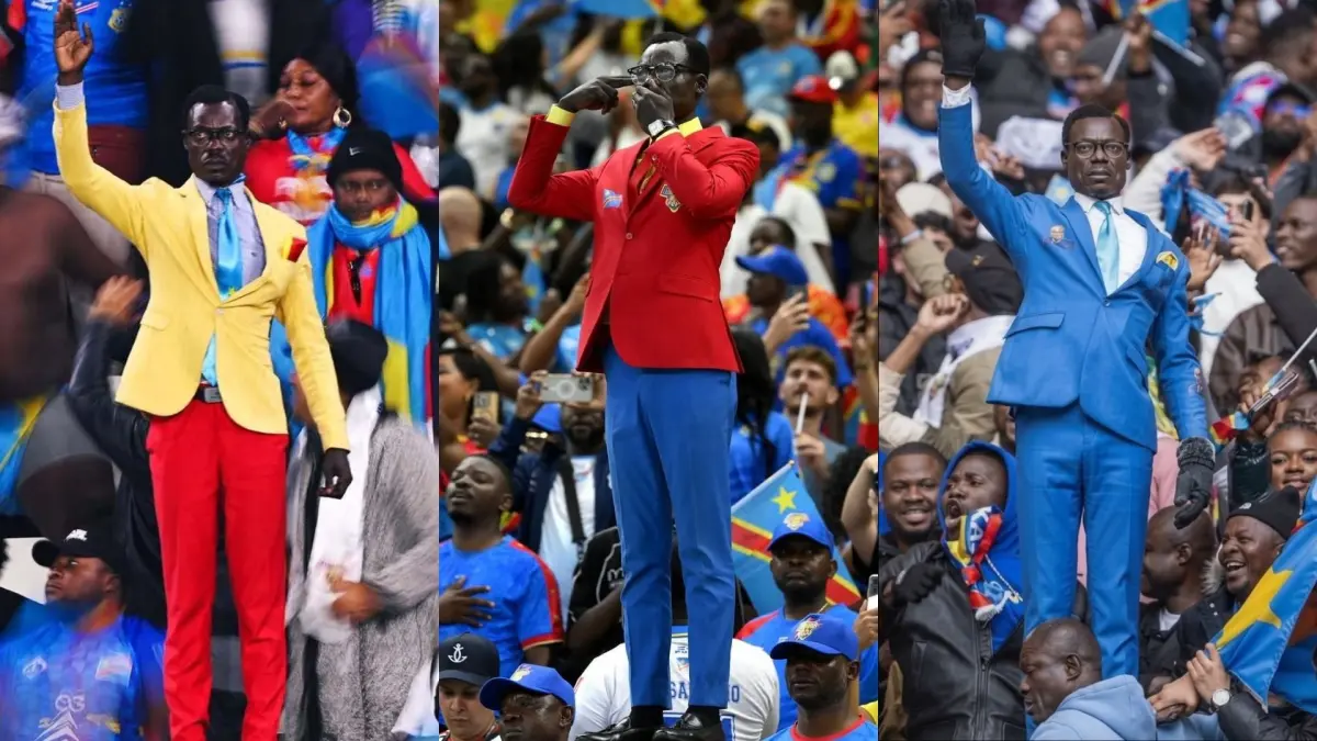 Michel Kuka Mboladinga berdiri tegak di tribun saat mendukung Timnas RD Kongo (X @TouchmineX & @manualjr)