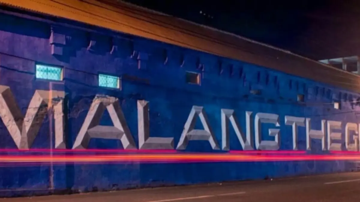 Mural "Malang The Glory Land" sebelum ditimpa tulisan lain. Sumber: Instagram/@malangraya_info.