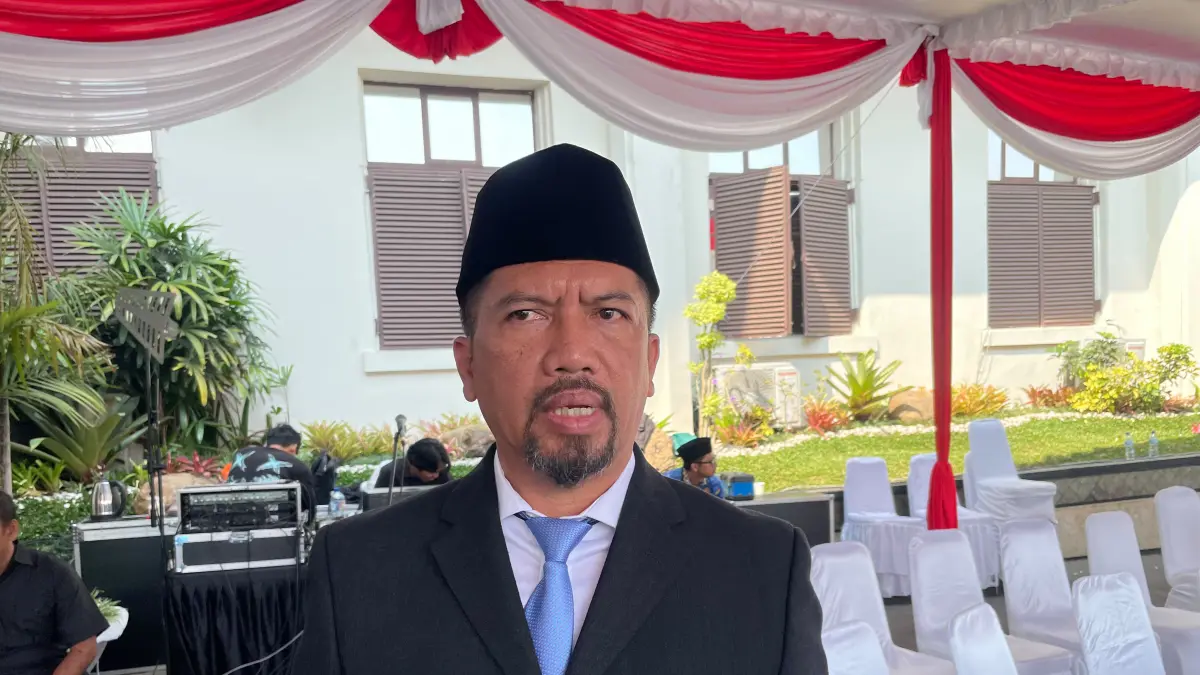 Plt Kepala Dinas Lingkungan Hidup Kota Malang Gamaliel Raymond Hatigoran memberikan keterangan kepada awak media, hari ini. (Andika Satria Perdana)