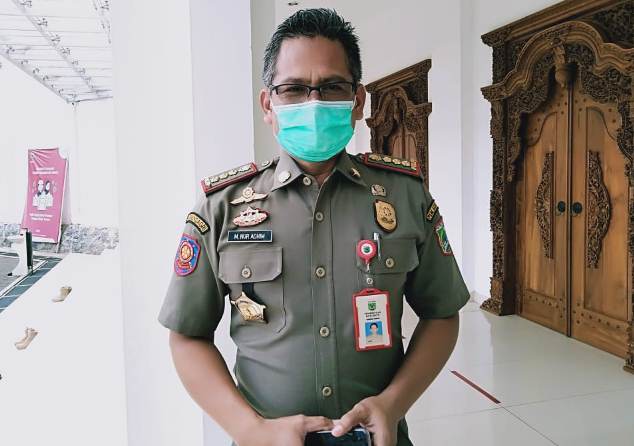 Kasatpol PP Kota Batu M Nur Adhim. (Imam Nasrodin/Radar Malang)
