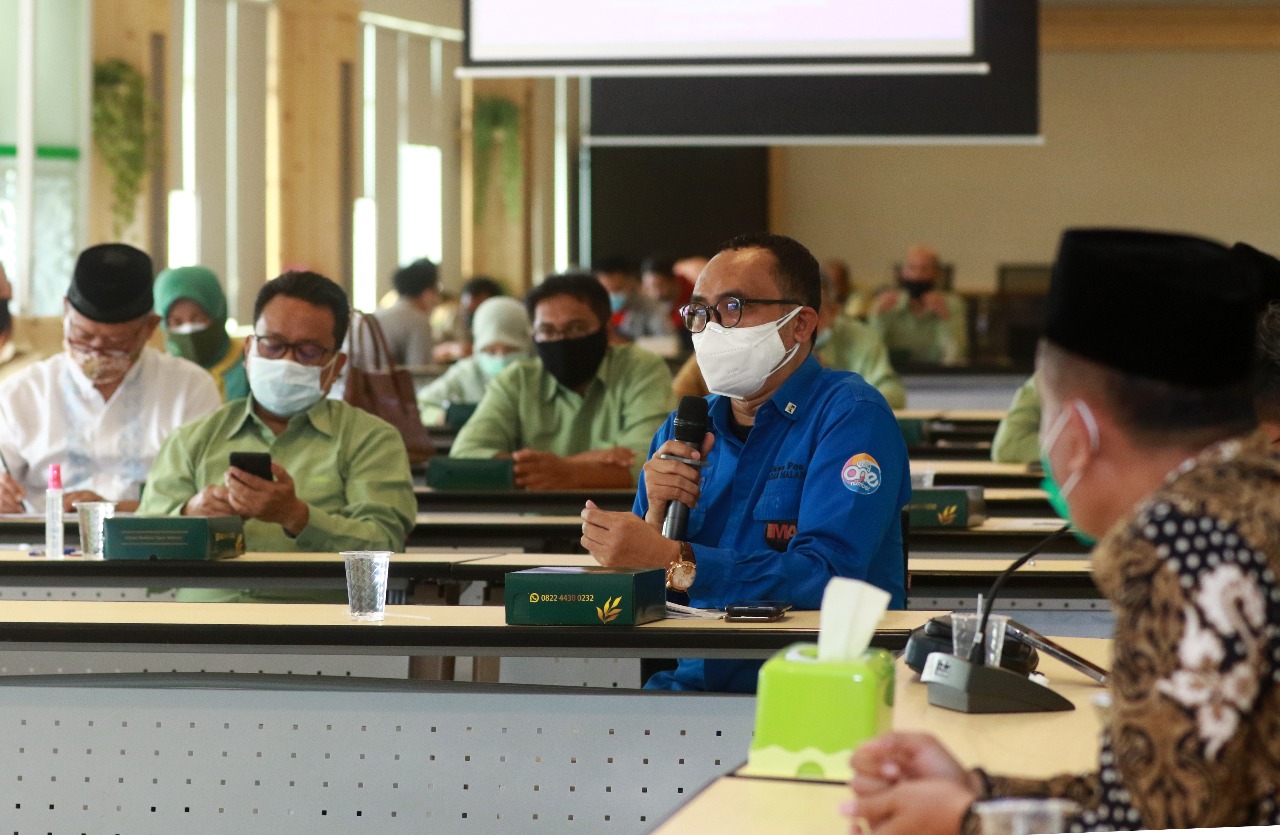 Direktur Jawa Pos Radar Malang, Kurniawan Muhammad (baju biru) (Rubianto / Radar Malang)