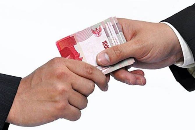 Ilustrasi korupsi (jawapos/ist)