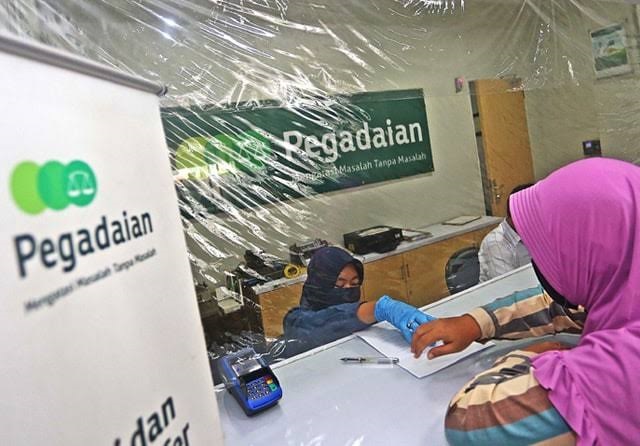 ILEGAL: Otoritas Jasa Keuangan (OJK) Malang mengungkap fakta mengejutkan. Pegadaian swasta di Bumi Arema tidak ada yang legal. Ilustrasi Pegadaian By Radar Malang