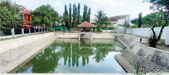 TUNTAS LEBIH CEPAT: Revitalisasi bozem atau kolam penangkal banjir sudah dirampungkan pihak pengembang, beberapa waktu lalu. (Suharto/ Radar Malang)