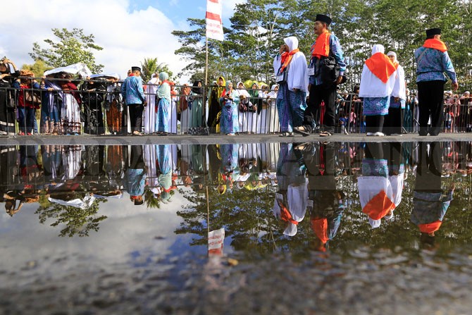 CERMIN : Ilustrasi pemberangkatan haji di wilayah Malang Raya. (Dokumentasi Radar Malang)